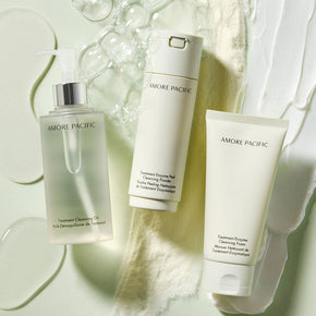 three skincare products on textured background